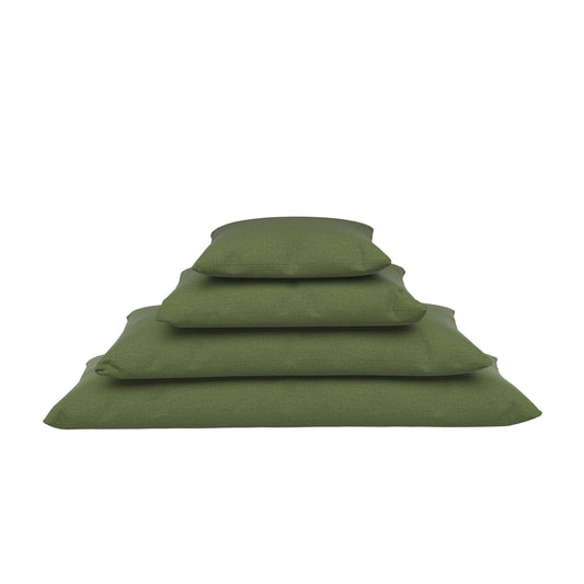Fern green lumbar pillows stacked on a white background.