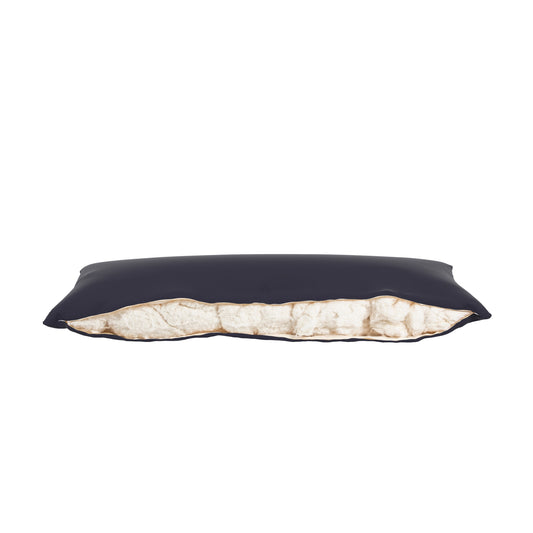Product image of a body pillow with a navy cover. Zipper open showing cotton inside.