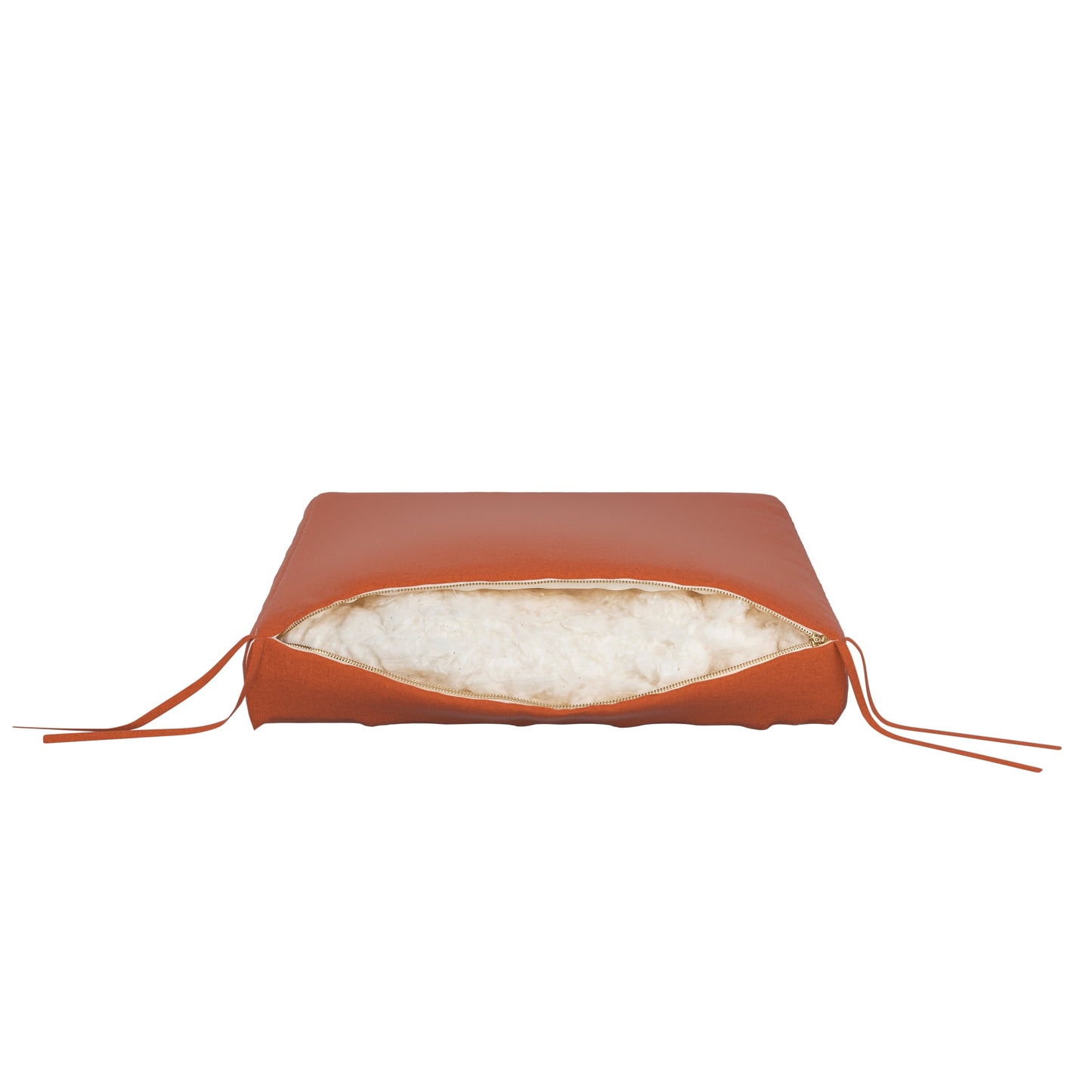Burnt orange seat cushion on a white background. Zipper open showing cotton inside.