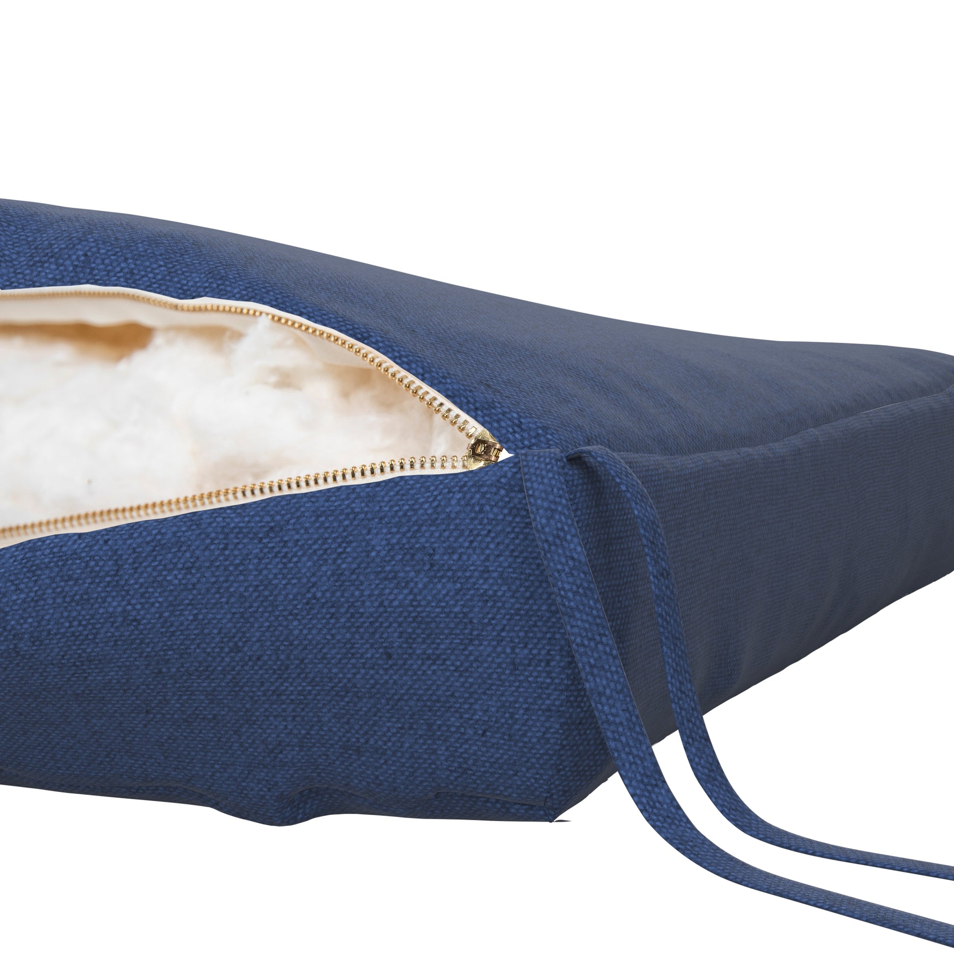 Denim blue seat cushion on a white background. Zipper open showing cotton inside.