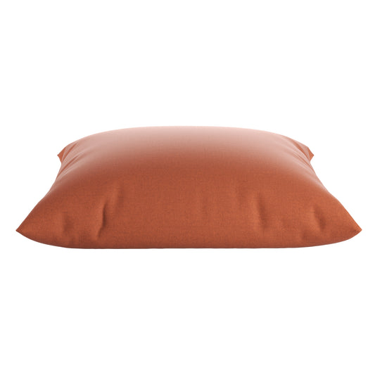 Burnt orange square pillow on a white background.