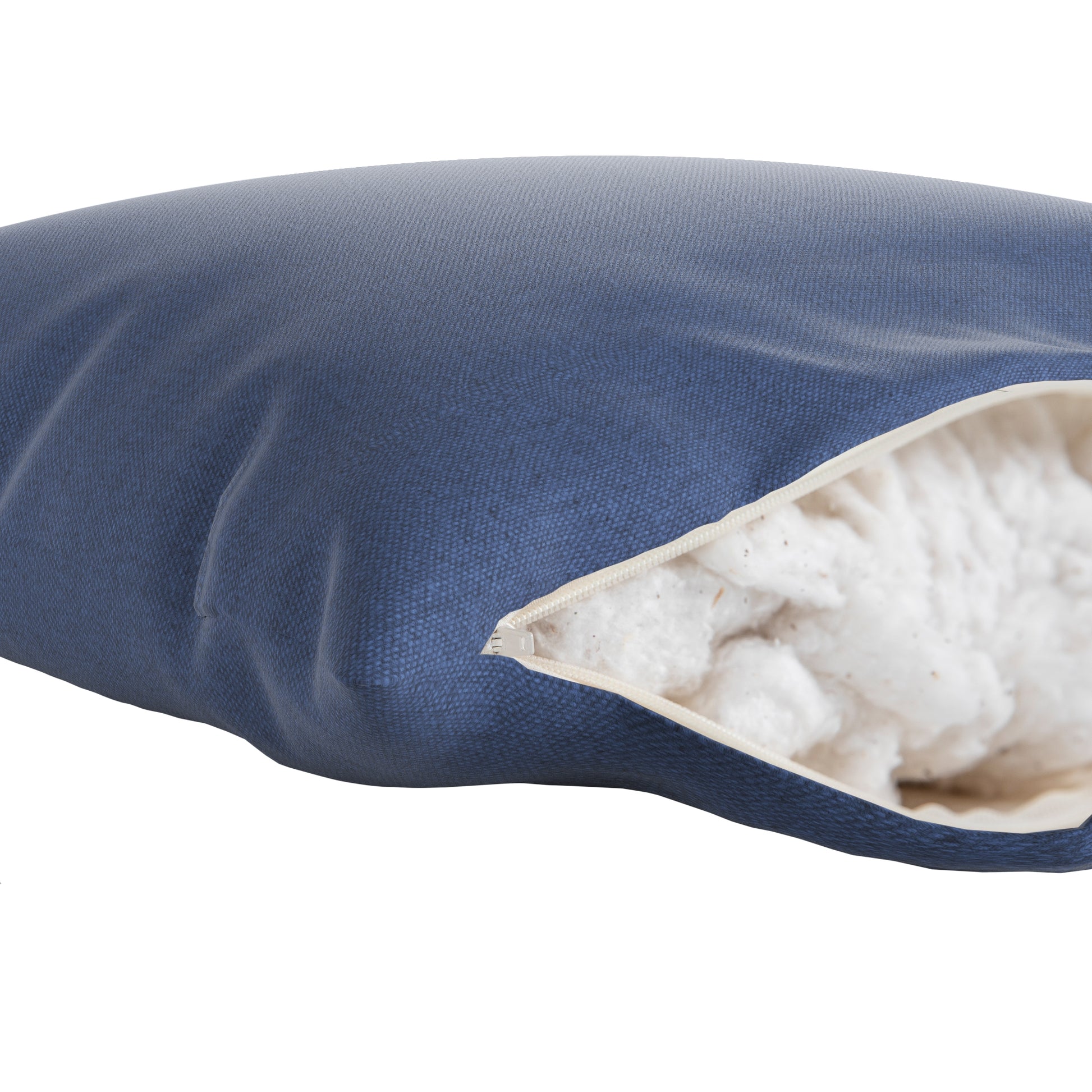 Denim blue navy pillow with zipper open showing cotton inside.