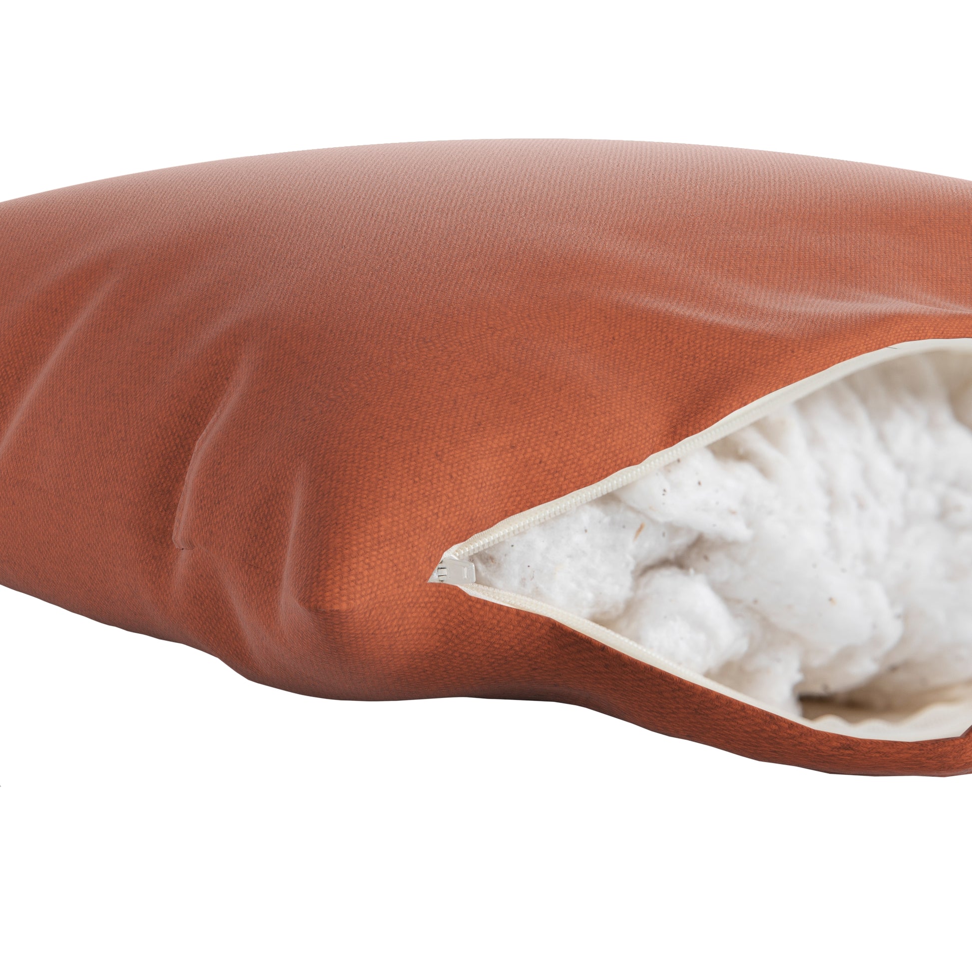 Burnt orange square pillow on a white background. Zipper open showing cotton inside.