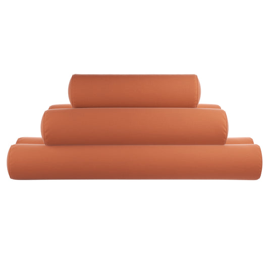 Burnt orange bolster pillows stacked on a white background.