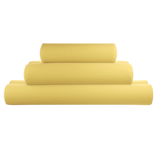 Yellow bolster pillows stacked on a white background.