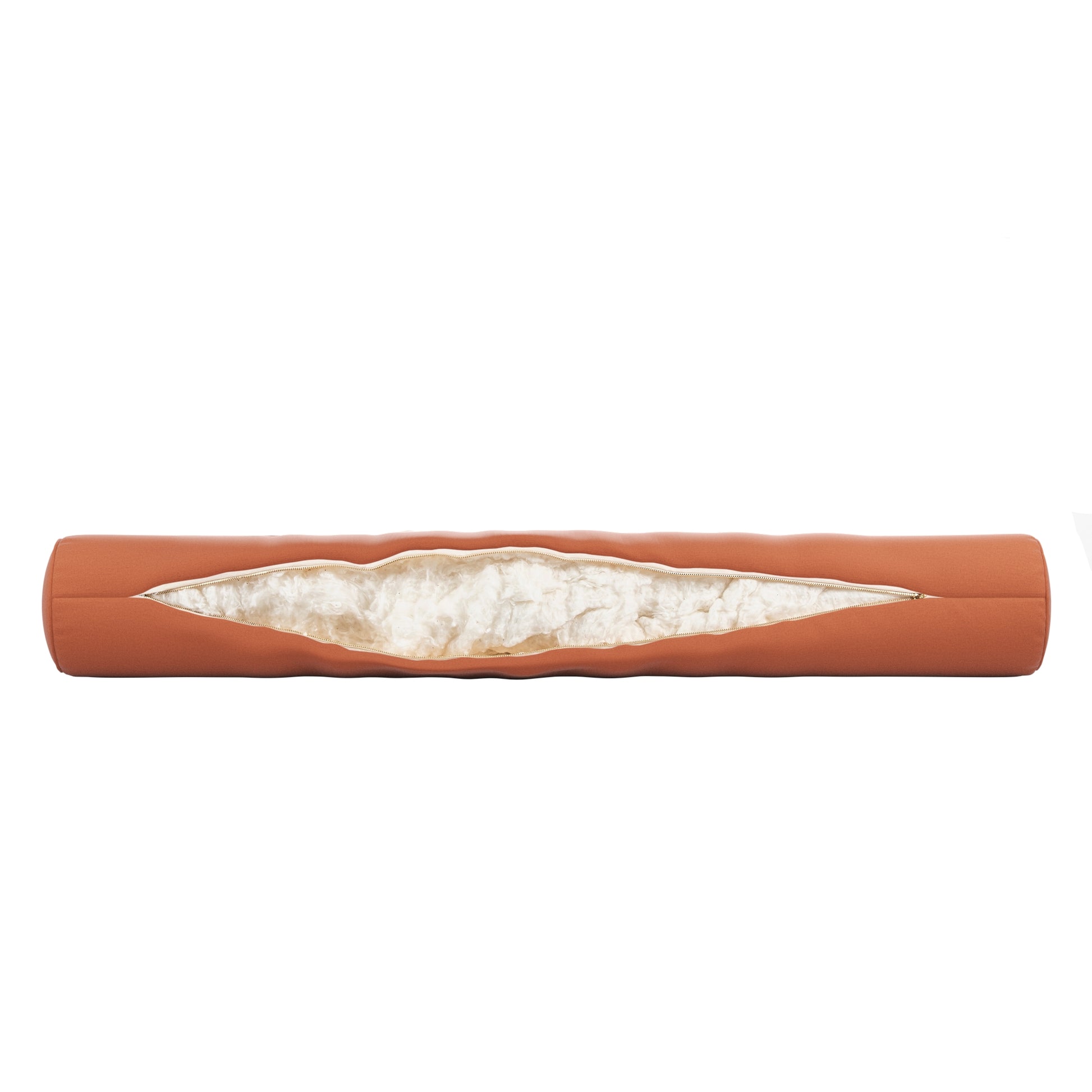 Burnt orange bolster pillow on a white background. Zipper open showing cotton inside.