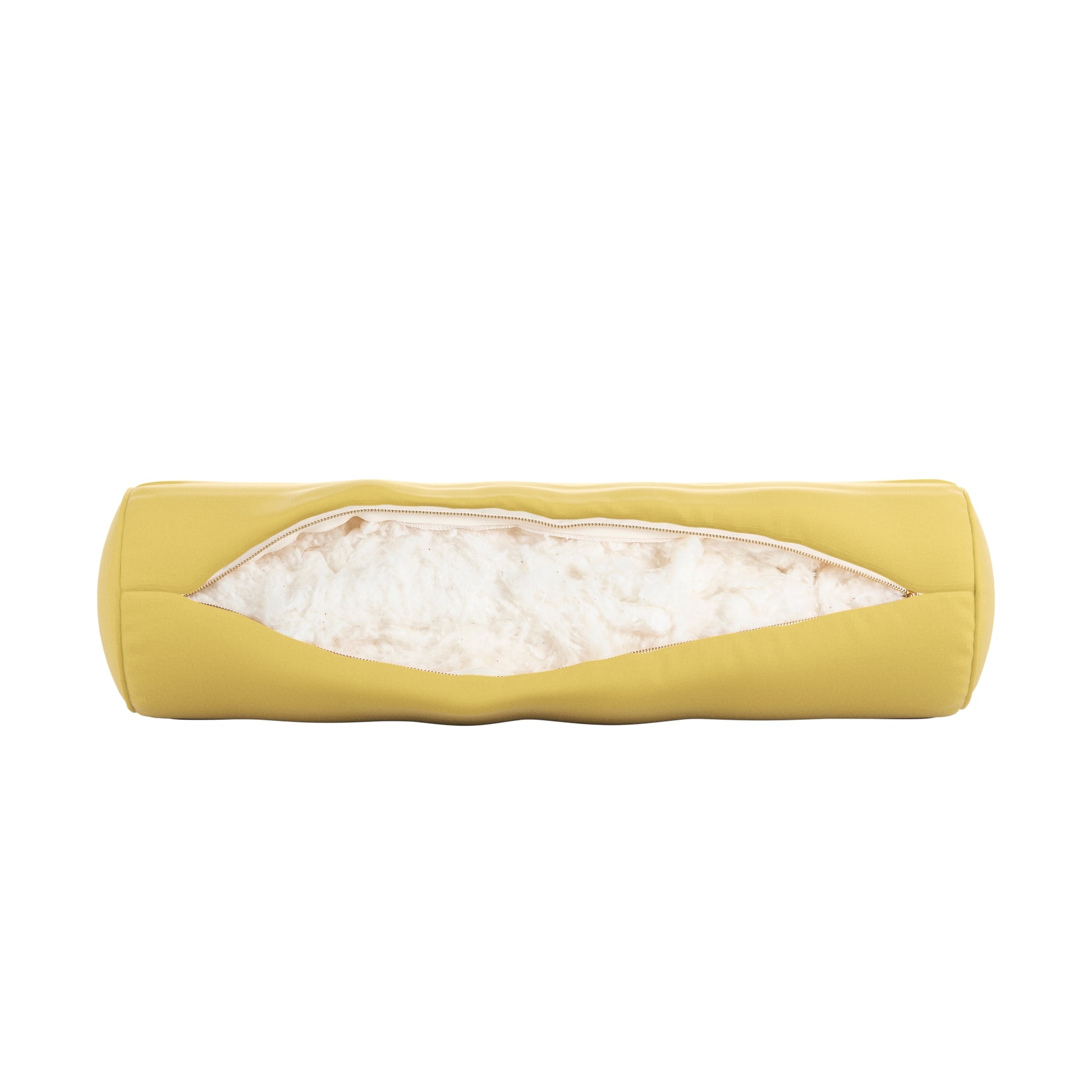 Yellow bolster pillow on a white background. Zipper open showing cotton inside.