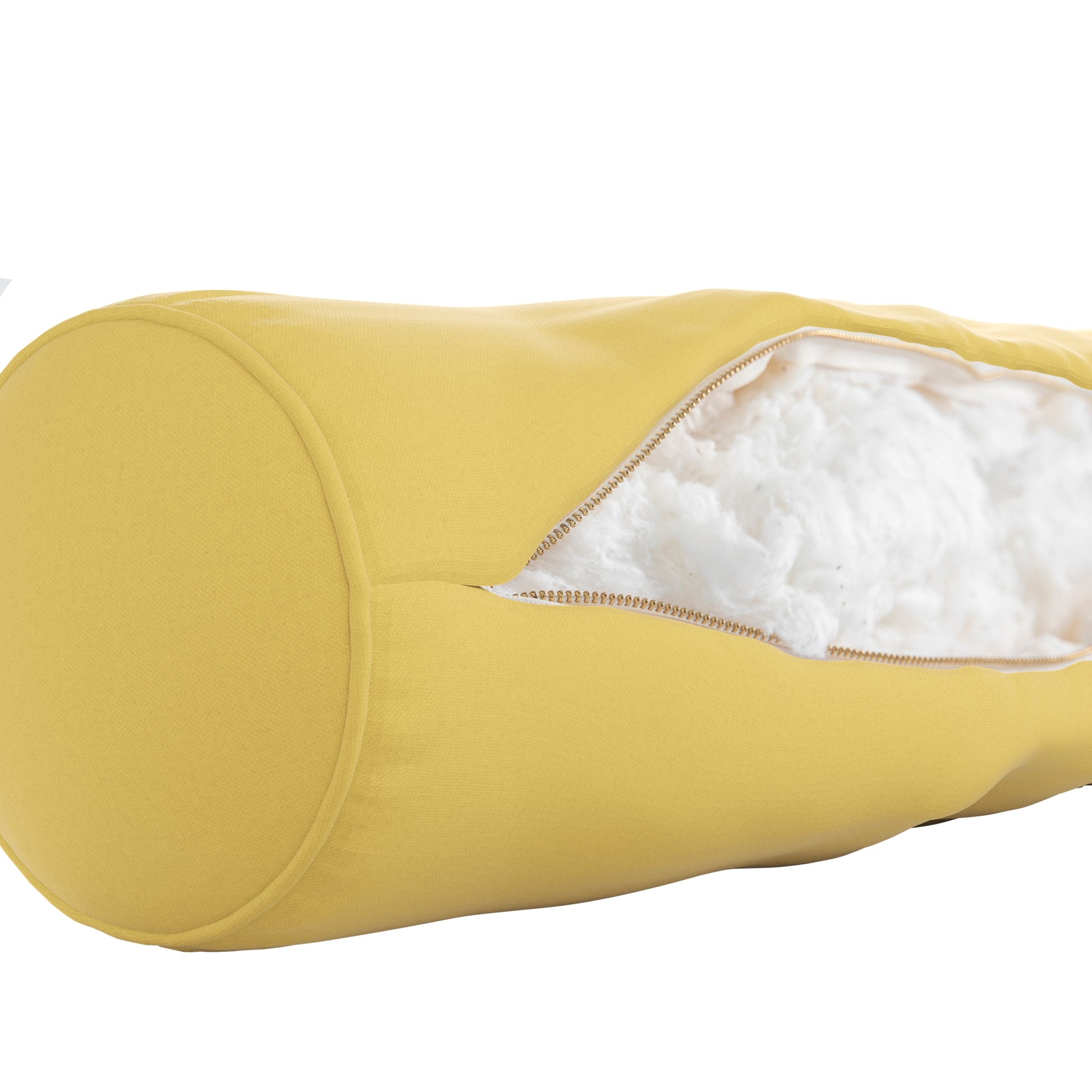 Yellow bolster pillow on a white background. Zipper open showing cotton inside.